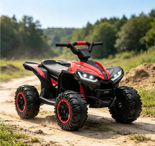 Quad électrique enfant rouge sur un chemin de terre, en pleine campagne